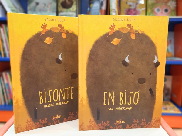 POrtada delos cuentos sobre el invierno y la hibernación de los bisontes en castellano y valenciano.